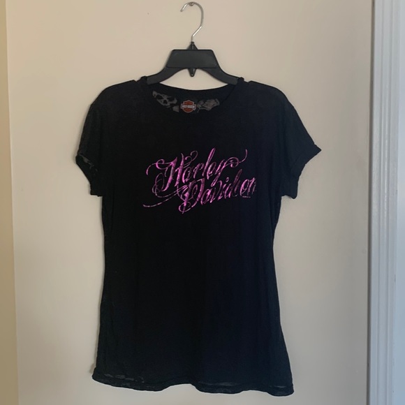 Harley Davidson black thin T-shirt with skull design seen when worn